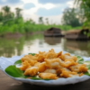 Krysar Thai Papaja Salad And Deep Fried Pieces Of Meet In Batte 05ea7141 Ab88 4257 9877 58d86090fb7b